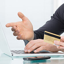 computer typing credit card