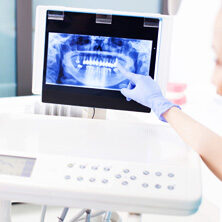 doctor pointing at x-ray